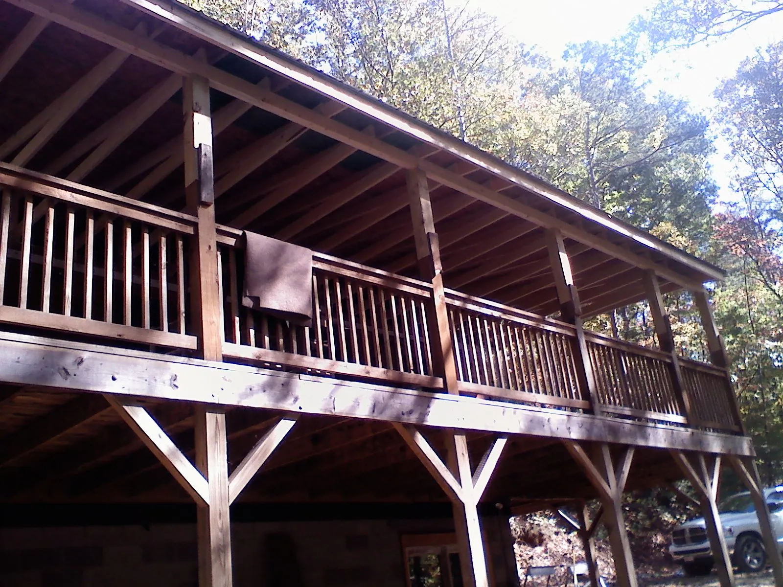 Timber framing under a new elevated porch and deck — Roof Leak Repair in Salida by Roofing Brothers